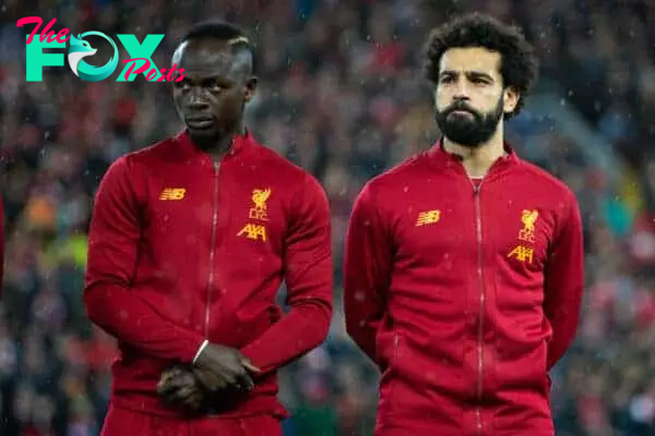 LIVERPOOL, ENGLAND - Wednesday, March 11, 2020: Liverpool's Sadio Mané (L) and Mohamed Salah line-up before the UEFA Champions League Round of 16 2nd Leg match between Liverpool FC and Club Atlético de Madrid at Anfield. (Pic by David Rawcliffe/Propaganda)