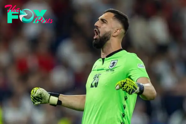 GELSENKIRCHEN, GERMANY - Wednesday, June 26, 2024: Georgia's goalkeeper Giorgi Mamardashvili celebrates his side's second goal during the UEFA Euro 2024 Group F match between Georgia and Portugal at the Arena AufSchalke. (Photo by David Rawcliffe/Propaganda)