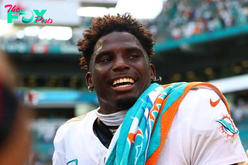 The Dolphins wide receiver was detained and handcuffed before the game against the Jaguars, but was released in time to play.