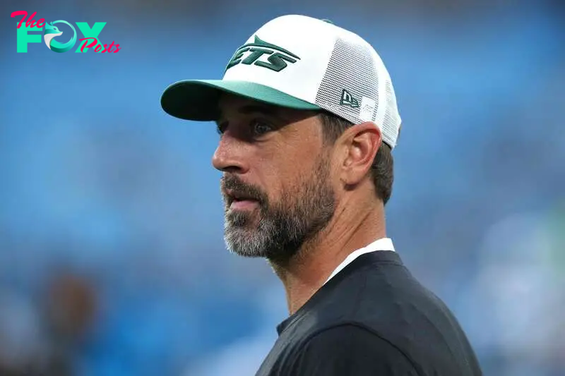 CHARLOTTE, NORTH CAROLINA - AUGUST 17: Aaron Rodgers #8 of the New York Jets looks on before their preseason game against the Carolina Panthers at Bank of America Stadium on August 17, 2024 in Charlotte, North Carolina.   Grant Halverson/Getty Images/AFP (Photo by GRANT HALVERSON / GETTY IMAGES NORTH AMERICA / Getty Images via AFP)