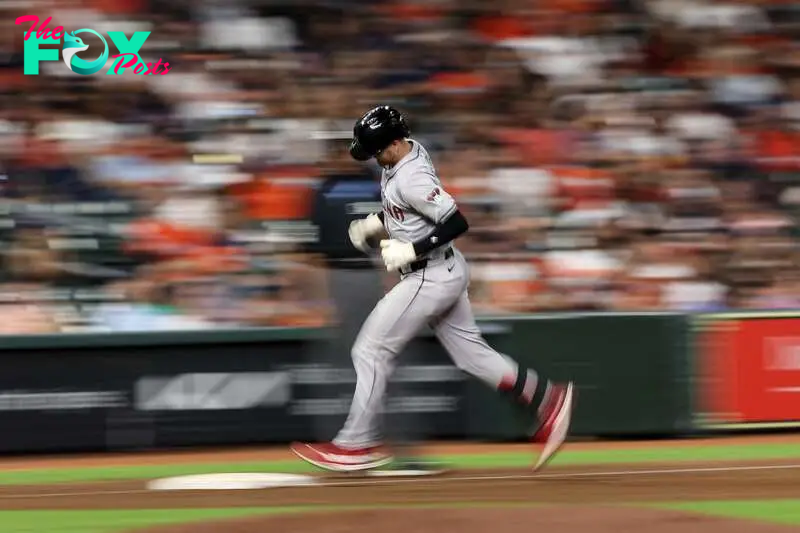 HOUSTON, TEXAS - SEPTEMBER 08: Pavin Smith #26 of the Arizona Diamondbacks rounds third base after hitting a solo home run in the fifth inning against the Houston Astros at Minute Maid Park on September 08, 2024 in Houston, Texas.   Tim Warner/Getty Images/AFP (Photo by Tim Warner / GETTY IMAGES NORTH AMERICA / Getty Images via AFP)