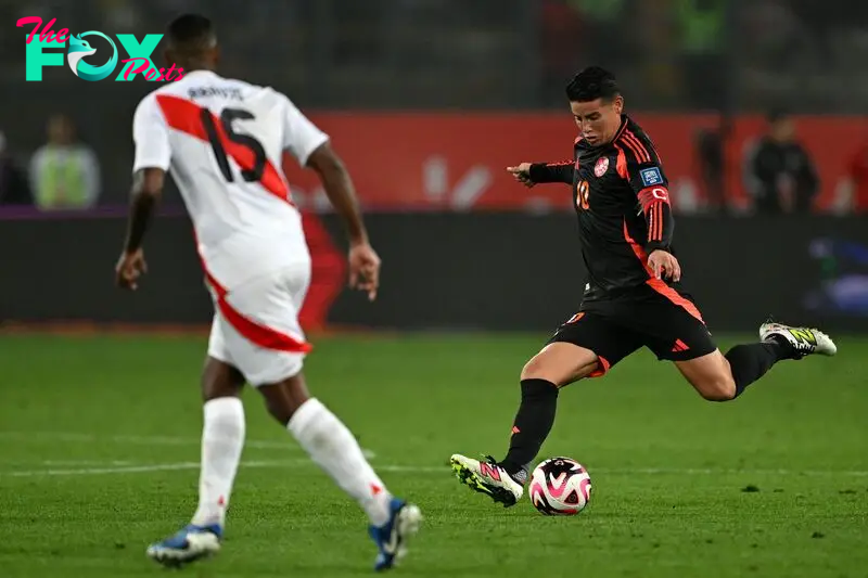 Colombia's midfielder James Rodriguez (R) controls the ball next to Peru's defender Miguel Araujo during the 2026 FIFA World Cup South American qualifiers football match between Peru and Colombia, at the Monumental stadium in Lima, on September 6, 2024. (Photo by ERNESTO BENAVIDES / AFP)