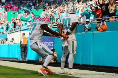 Sep 8, 2024; Miami Gardens, Florida, USA; Miami Dolphins wide receiver Tyreek Hill (10) celebrates with wide receiver Jaylen Waddle (17) after scoring a touchdown against the Jacksonville Jaguars during the third quarter at Hard Rock Stadium. Mandatory Credit: Sam Navarro-Imagn Images