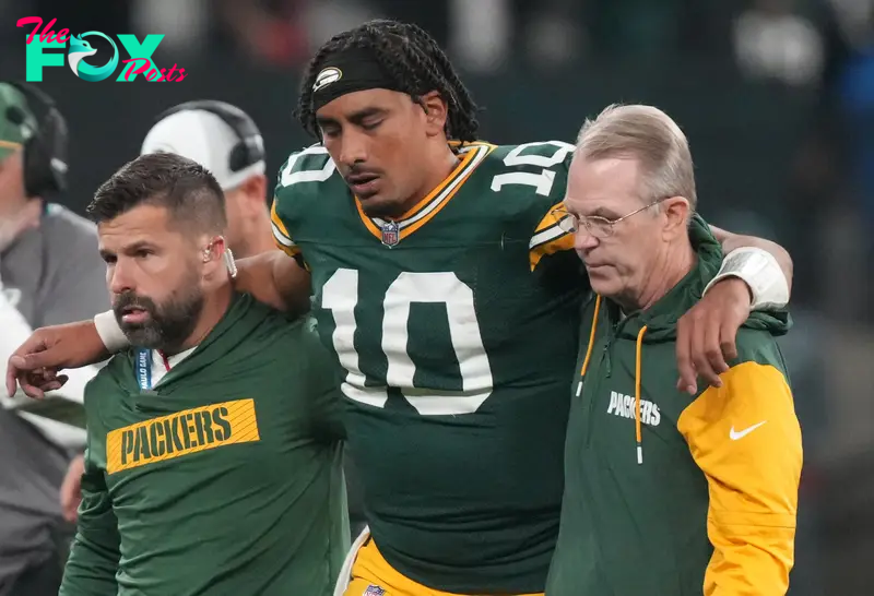 Sep 6, 2024; Sao Paulo, BRA; Green Bay Packers quarterback Jordan Love (10) is assisted off the field after an injury during the second half against the Philadelphia Eagles at Neo Quimica Arena. Mandatory Credit: Kirby Lee-Imagn Images