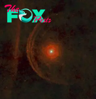 A blurry image of a red star with a large red halo around it