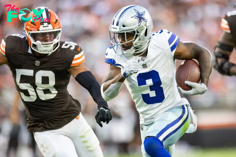 Sep 8, 2024; Cleveland, Ohio, USA; Dallas Cowboys wide receiver Brandin Cooks (3) runs the ball past Cleveland Browns linebacker Jordan Hicks (58) during the fourth quarter at Huntington Bank Field. Mandatory Credit: Scott Galvin-Imagn Images