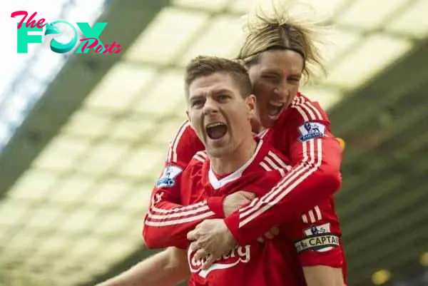 BIRMINGHAM, ENGLAND - Sunday, April 4, 2010: Liverpool's captain Steven Gerrard MBE celebrates scoring the opening goal against Birmingham City with team-mate Fernando Torres during the Premiership match at St Andrews. (Photo by David Rawcliffe/Propaganda)