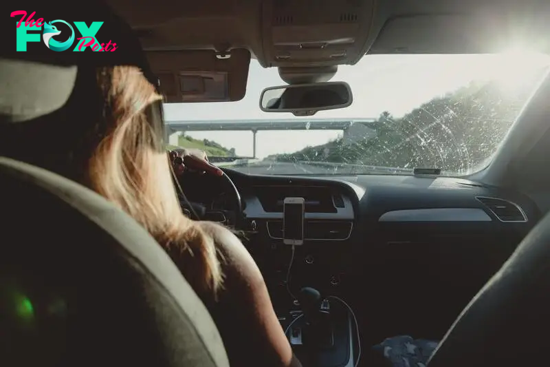 A woman driving a car | Source: Pexels