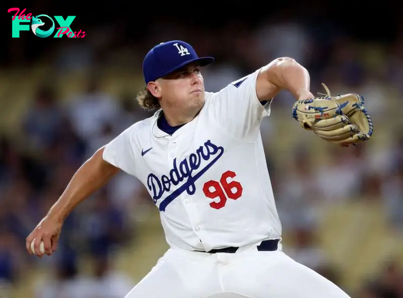 LOS ANGELES, CALIFORNIA - SEPTEMBER 06: Landon Knack #96 of the Los Angeles Dodgers pitches against the Cleveland Guardians during the first inning at Dodger Stadium on September 06, 2024 in Los Angeles, California.   Harry How/Getty Images/AFP (Photo by Harry How / GETTY IMAGES NORTH AMERICA / Getty Images via AFP)