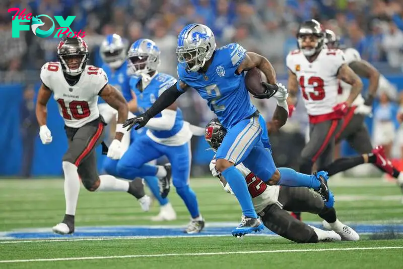 DETROIT, MICHIGAN - JANUARY 21: C.J. Gardner-Johnson #2 of the Detroit Lions returns an interception against the Tampa Bay Buccaneers during the first quarter of the NFC Divisional Playoff game at Ford Field on January 21, 2024 in Detroit, Michigan.   Nic Antaya/Getty Images/AFP (Photo by Nic Antaya / GETTY IMAGES NORTH AMERICA / Getty Images via AFP)