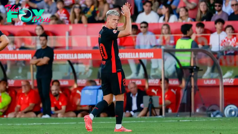 Why isn’t Dani Olmo playing for Barcelona against Monaco in the Champions League today?