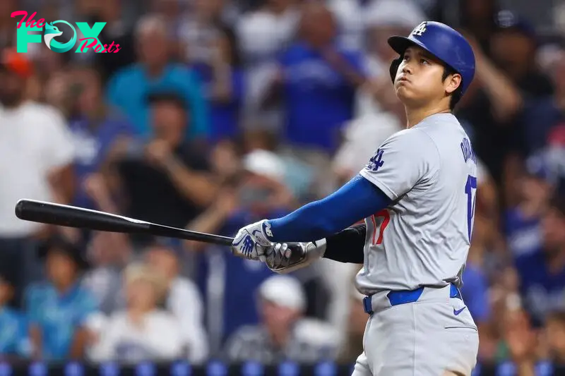 MIAMI, FLORIDA - SEPTEMBER 19: Shohei Ohtani #17 of the Los Angeles Dodgers hits a two-run home run, his 50th of the season, during the seventh inning against the Miami Marlins at loanDepot park on September 19, 2024 in Miami, Florida. Ohtani is now the first MLB player to have at least 50 home runs and 50 stolen bases in the same season.   Megan Briggs/Getty Images/AFP (Photo by Megan Briggs / GETTY IMAGES NORTH AMERICA / Getty Images via AFP)