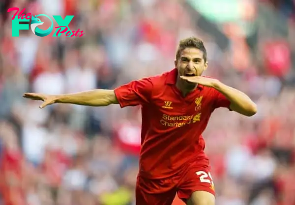 LIVERPOOL, ENGLAND - Thursday, August 9, 2012: Liverpool's Fabio Borini celebrates scoring the opening goal against FC Gomel on his home debut during the UEFA Europa League Third Qualifying Round 2nd Leg match at Anfield. (Pic by David Rawcliffe/Propaganda)