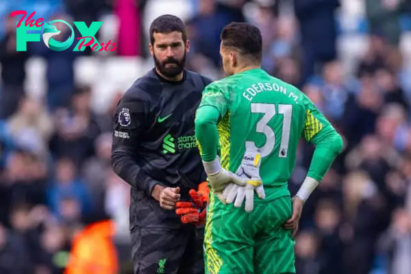 MANCHESTER, ENGLAND - Saturday, November 25, 2023: Liverpool's goalkeeper Alisson Becker (L) and Brazil international team-mate Manchester City's goalkeeper Ederson Santana de Moraes after the FA Premier League match between Manchester City FC and Liverpool FC at the City of Manchester Stadium. (Photo by David Rawcliffe/Propaganda)