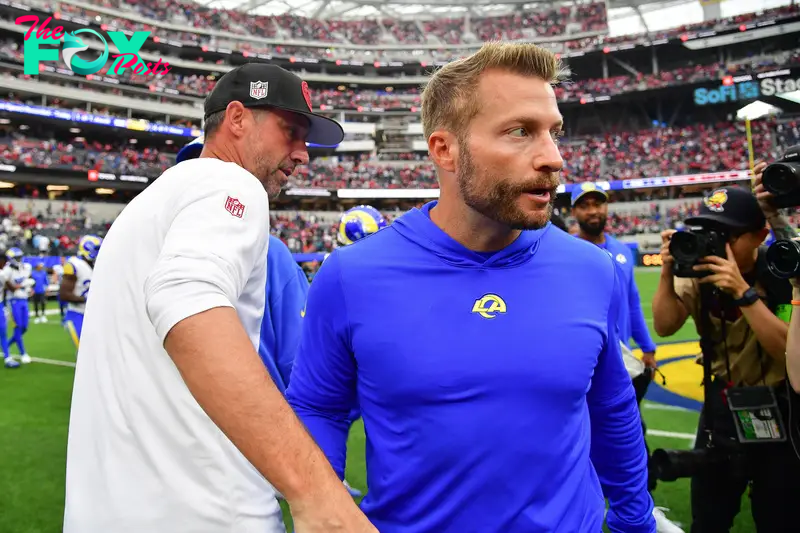 Sep 17, 2023; Inglewood, California, USA; San Francisco 49ers head coach Kyle Shanahan meets with Los Angeles Rams head coach Sean McVay following the victory at SoFi Stadium. Mandatory Credit: Gary A. Vasquez-USA TODAY Sports