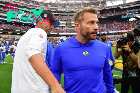 Sep 17, 2023; Inglewood, California, USA; San Francisco 49ers head coach Kyle Shanahan meets with Los Angeles Rams head coach Sean McVay following the victory at SoFi Stadium. Mandatory Credit: Gary A. Vasquez-USA TODAY Sports