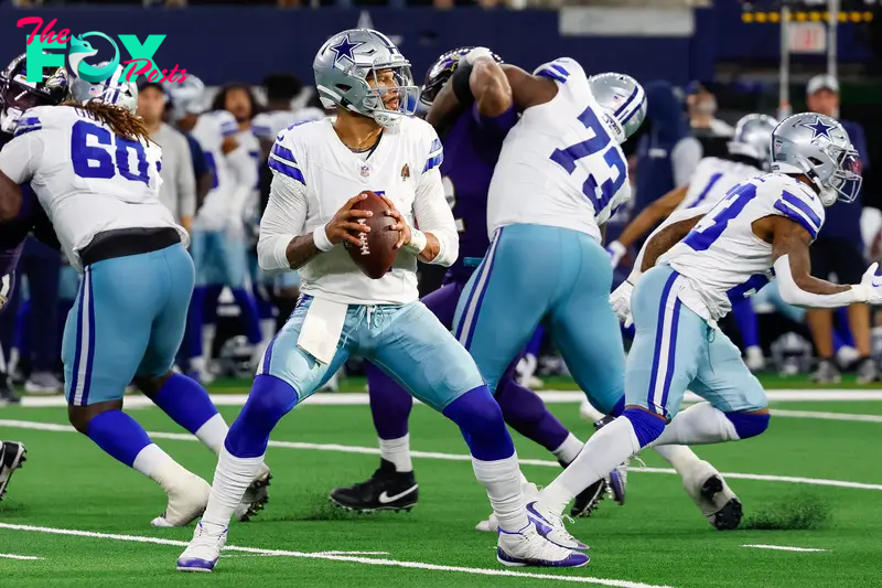 Sep 22, 2024; Arlington, Texas, USA; Dallas Cowboys quarterback Dak Prescott (4) drops back to pass fourth quarter against the Baltimore Ravens at AT&T Stadium. Mandatory Credit: Andrew Dieb-Imagn Images