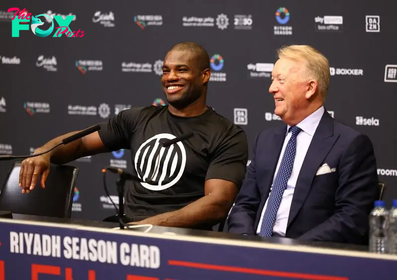 Boxing - Daniel Dubois v Anthony Joshua - IBF World Heavyweight Title - Wembley Stadium, London, Britain - September 21, 2024 Daniel Dubois alongside promoter Frank Warren during the press conference after winning his fight against Anthony Joshua Action Images via Reuters/Andrew Boyers