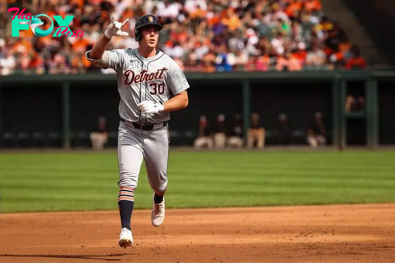 BALTIMORE, MD - SEPTEMBER 22: Kerry Carpenter #30 of the Detroit Tigers reacts while rounding the bases after hitting a solo home run against the Baltimore Orioles during the third inning at Oriole Park at Camden Yards on September 22, 2024 in Baltimore, Maryland.   Scott Taetsch/Getty Images/AFP (Photo by Scott Taetsch / GETTY IMAGES NORTH AMERICA / Getty Images via AFP)