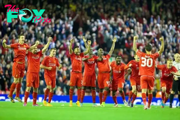 LIVERPOOL, ENGLAND - Tuesday, September 23, 2014: Liverpool players celebrate after winning the penalty shoot-out against Middlesbrough following a 2-2 draw during the Football League Cup 3rd Round match at Anfield. (Pic by David Rawcliffe/Propaganda)