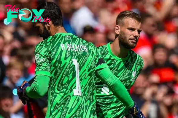 LIVERPOOL, ENGLAND - Sunday, August 11, 2024: Liverpool's goalkeeper Alisson Becker embraces substitute goalkeeper Vitezslav Jaros during a pre-season friendly match between Liverpool FC and Sevilla FC at Anfield. (Photo by David Rawcliffe/Propaganda)