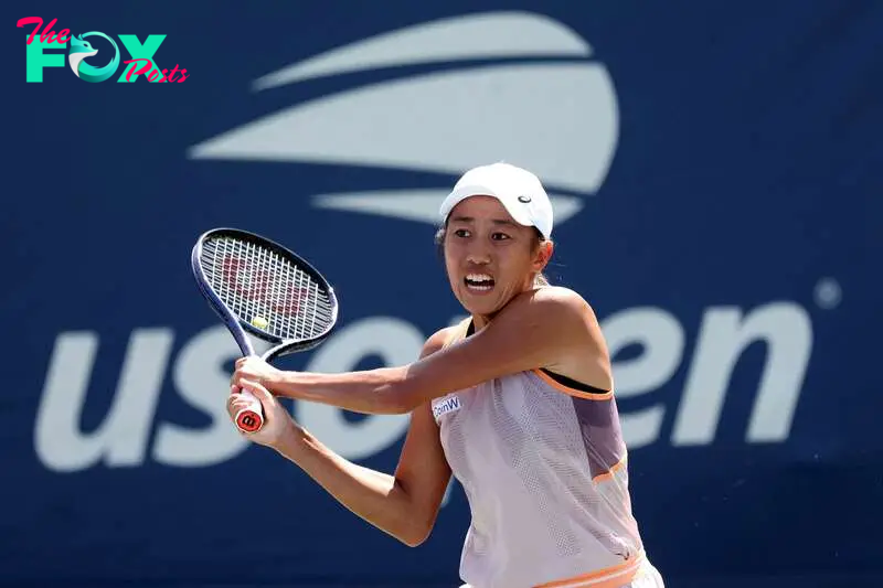 NEW YORK, NEW YORK - AUGUST 27: Shuai Zhang of China returns against Ashlyn Krueger of the United States during their Women's Singles First Round match `on Day Two of the 2024 US Open at the USTA Billie Jean King National Tennis Center on August 27, 2024 in the Flushing neighborhood of the Queens borough of New York City.   Jamie Squire/Getty Images/AFP (Photo by JAMIE SQUIRE / GETTY IMAGES NORTH AMERICA / Getty Images via AFP)