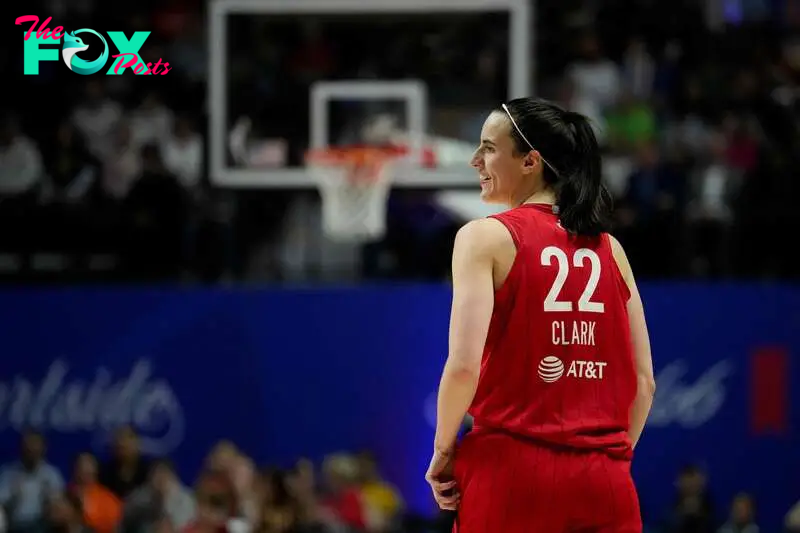 Caitlin Clark #22 of the Indiana Fever looks as she plays the Connecticut Sun during the fourth quarter of Game Two of the 2024 WNBA Playoffs