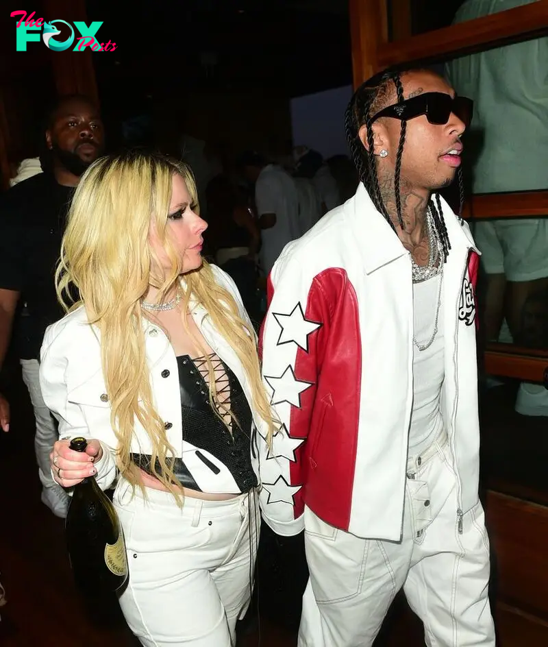 Avril Lavigne and Tyga attend Red White & Bootsy at Nobu Malibu on July 04, 2023 in Malibu, California.