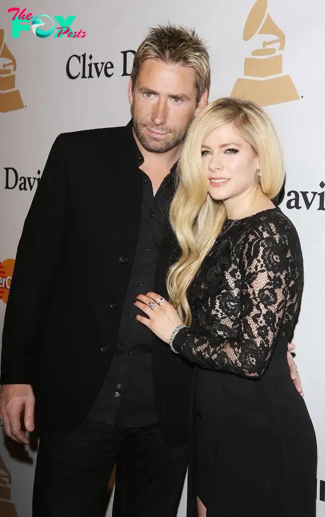 Chad Kroeger and Avril Lavigne arrive at the 2016 Pre-GRAMMY Gala and Salute to Industry Icons honoring Irving Azoff held at The Beverly Hilton Hotel on February 14, 2016 in Beverly Hills, California.