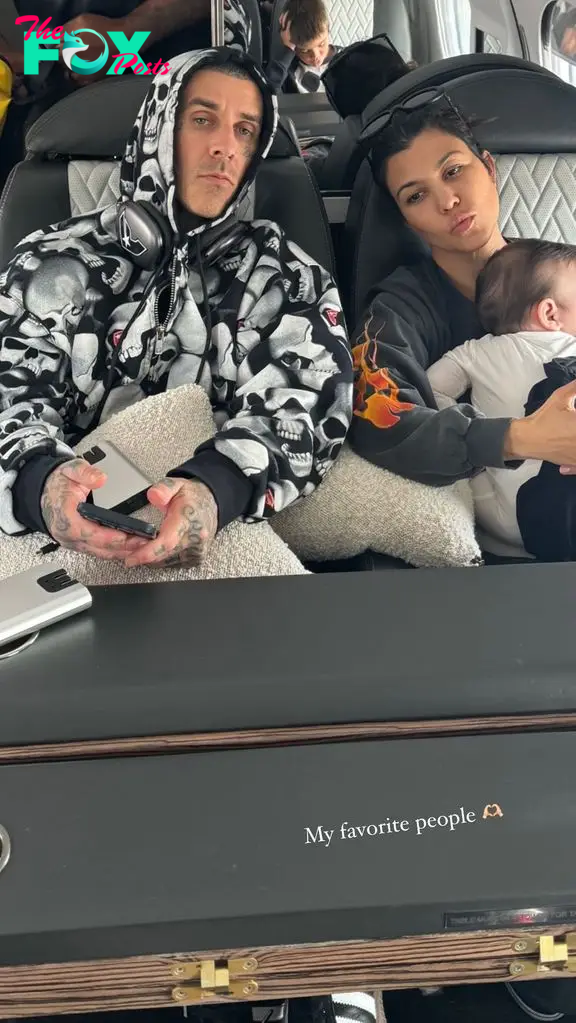 Kourtney Kardashian and husband Travis Barker with son Rocky