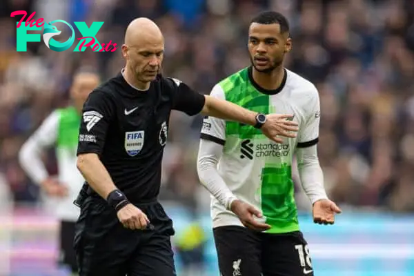 LONDON, ENGLAND - Saturday, April 27, 2024: Referee Anthony Taylor (L) and Liverpool's Cody Gakpo during the FA Premier League match between West Ham United FC and Liverpool FC at the London Stadium. (Photo by David Rawcliffe/Propaganda)