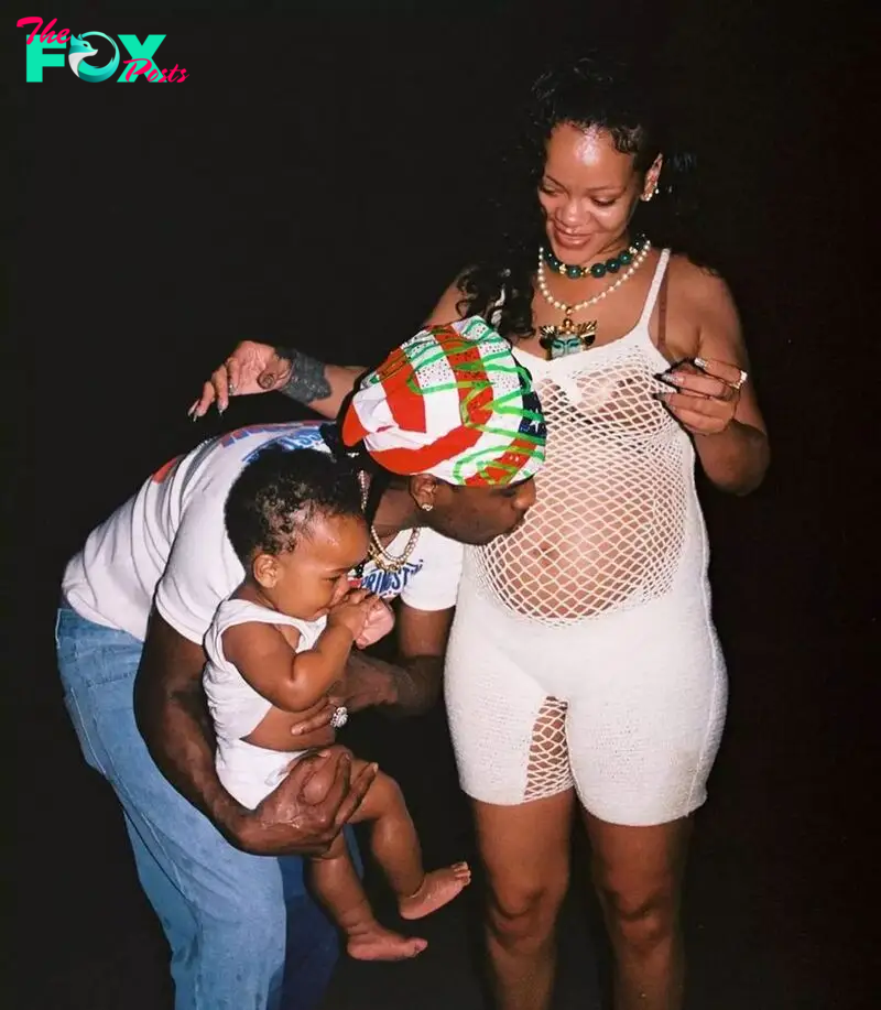 Rihanna's partner Rocky kisses her bump while holding their son