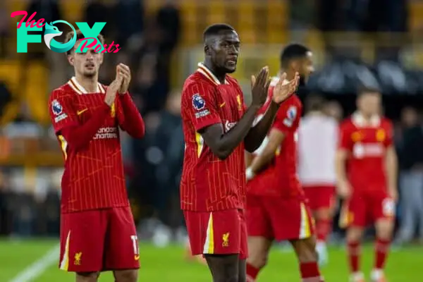 WOLVERHAMPTON, ENGLAND - Saturday, September 28, 2024: Liverpool's Curtis Jones (L) and Ibrahima Konaté applauds the supporters after the FA Premier League match between Wolverhampton Wanderers FC and Liverpool FC at Molineux Stadium. (Photo by David Rawcliffe/Propaganda)