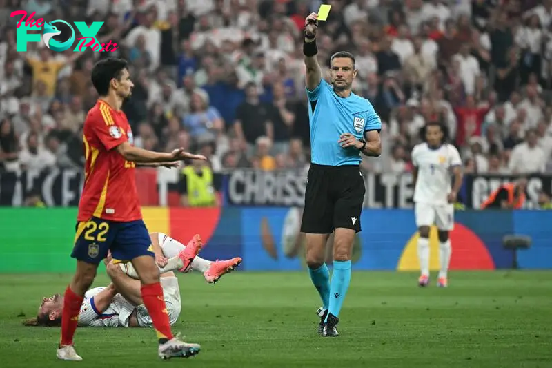 Vincic books Spain's Jesús Navas during the UEFA Euro 2024 semi-final between La Roja and France in Munich.