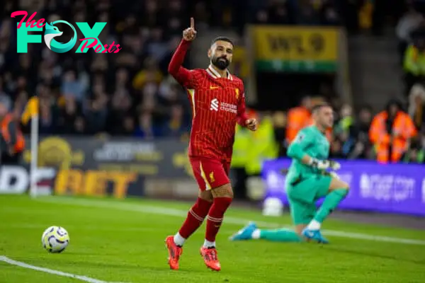 WOLVERHAMPTON, ENGLAND - Saturday, September 28, 2024: Liverpool's Mohamed Salah celebrates after scoring his side's second goal, from a penalty kick, during the FA Premier League match between Wolverhampton Wanderers FC and Liverpool FC at Molineux Stadium. (Photo by David Rawcliffe/Propaganda)