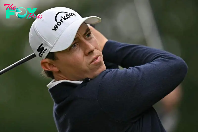 England's Matt Fitzpatrick watches his drive from the 4th tee on day two of the BMW PGA Championship at Wentworth Golf Club, south-west of London, on September 20, 2024. (Photo by Glyn KIRK / AFP) / RESTRICTED TO EDITORIAL USE