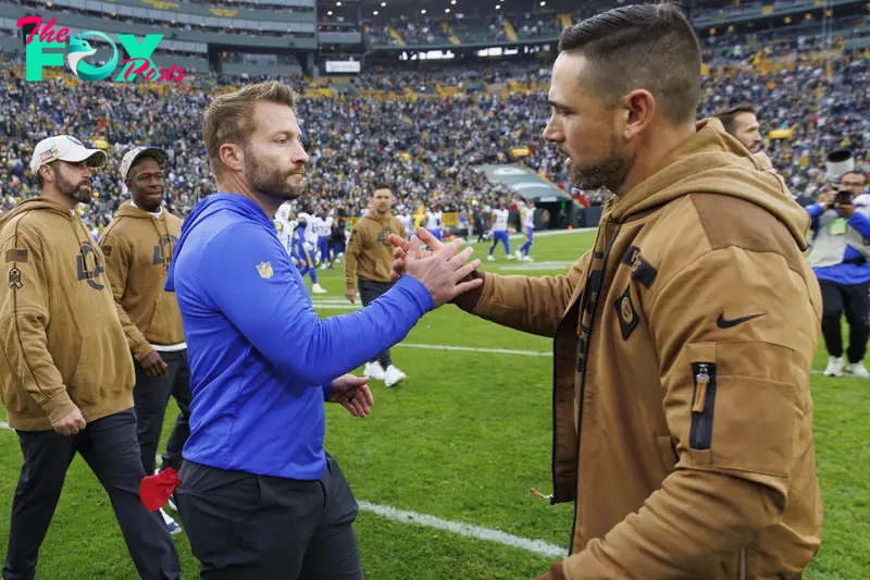 Nov 5, 2023; Green Bay, Wisconsin, USA;  Los Angeles Rams head coach Sean McVay greets Green Bay Packers head coach Matt LaFleur following the game at Lambeau Field. Mandatory Credit: Jeff Hanisch-USA TODAY Sports