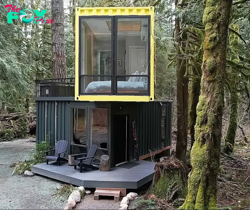 Front view of the eco-friendly home showing the mos-covered trees that surround it.