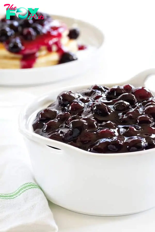 Homemade Blueberry Sauce comes together in just a few minutes. Try a spoonful with your morning yogurt or poured over a stack of pancakes for a delicious treat!