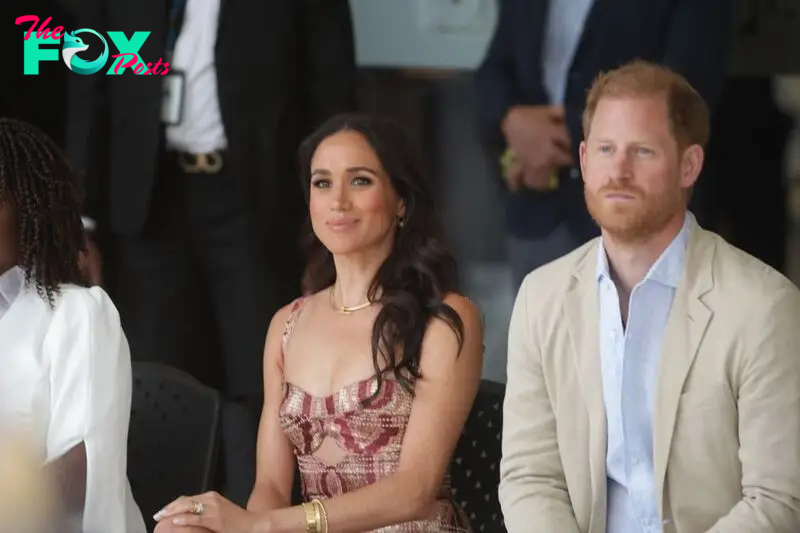 Prince Harry and Meghan Markle sat down with hands on their knees