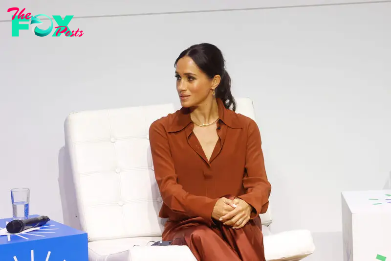 Meghan Markle sits on a couch during a forum in Bogota, Colombia