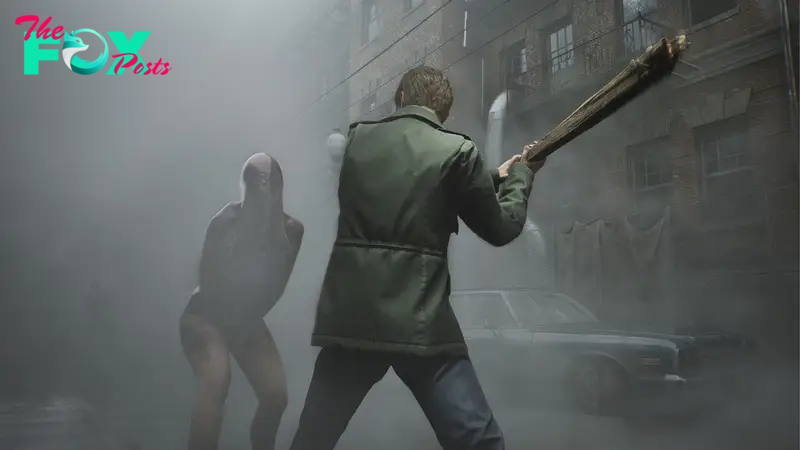 James, the protagonist of Silent Hill 2, brandishes a baseball bat in the face of an encroaching mannequin monster