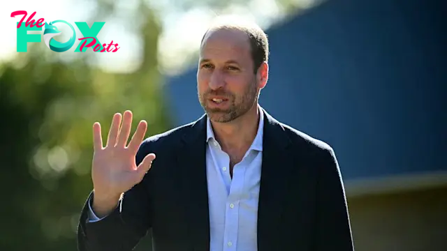 Britain's Prince William, Prince of Wales, waves upon his arrival to visit Birtley Community Pool 