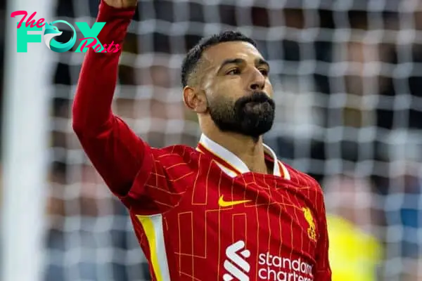 WOLVERHAMPTON, ENGLAND - Saturday, September 28, 2024: Liverpool's Mohamed Salah celebrates after scoring his side's second goal, from a penalty kick, during the FA Premier League match between Wolverhampton Wanderers FC and Liverpool FC at Molineux Stadium. (Photo by David Rawcliffe/Propaganda)