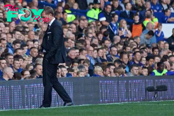 LIVERPOOL, ENGLAND - Sunday, October 4, 2015: Liverpool's manager Brendan Rodgers walks dejectedly off the touchline during his last hame as Liverpool manager during the Premier League match against Everton at Goodison Park, the 225th Merseyside Derby. (Pic by Lexie Lin/Propaganda)