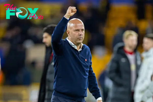 WOLVERHAMPTON, ENGLAND - Saturday, September 28, 2024: Liverpool's head coach Arne Slot celebrates after the FA Premier League match between Wolverhampton Wanderers FC and Liverpool FC at Molineux Stadium. Liverpool won 2-1. (Photo by David Rawcliffe/Propaganda)