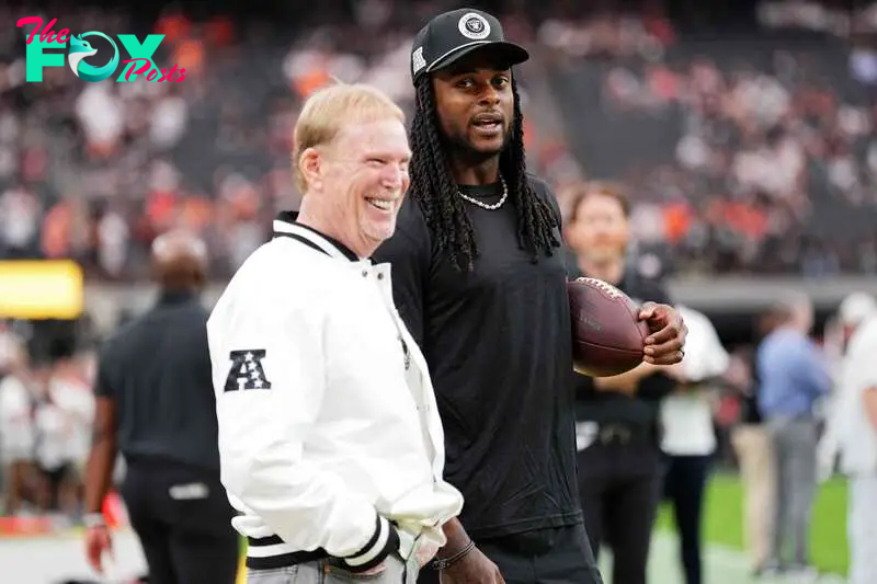 LAS VEGAS, NEVADA - SEPTEMBER 29: Davante Adams #17 of the Las Vegas Raiders and team owner Mark Davis look on before the game against the Cleveland Browns at Allegiant Stadium on September 29, 2024 in Las Vegas, Nevada.   Jeff Bottari/Getty Images/AFP (Photo by Jeff Bottari / GETTY IMAGES NORTH AMERICA / Getty Images via AFP)