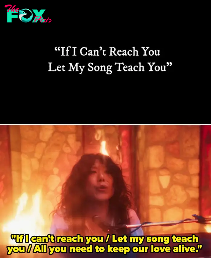 Alice plays piano with fire in the background. Text above reads, &quot;If I Can’t Reach You Let My Song Teach You&quot;