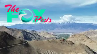 A photo of the Kashmir Valley taken from the top of one of the peaks on its rim