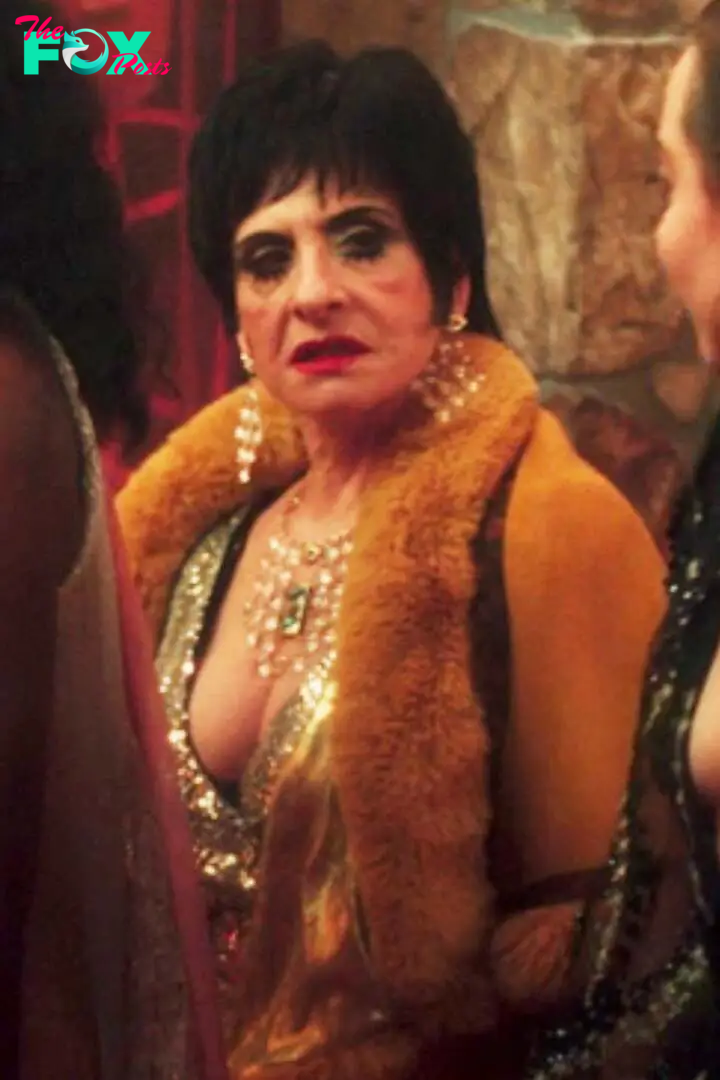 Patti LuPone as Lilia in "Agatha All Along" with a short black-haired wig and fur jacket